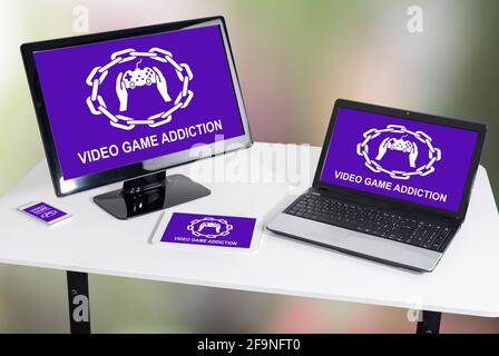 Video game addiction concept shown on different information technology devices Stock Photo