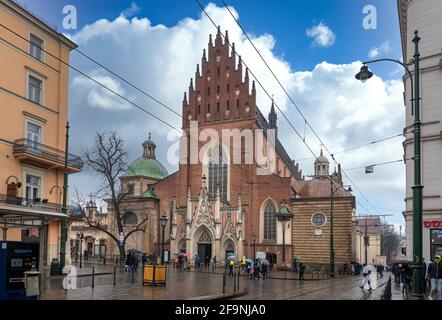 KRAKOW, POLAND. Holy Trinity Church in the Old Town district of Krakow, near the All Saints Square. Gothic basilica, monastery of the Dominican Order. Stock Photo