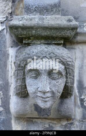 Canterbury, Kent, UK. Canterbury Cathedral: medieval carved stone face on the Western facade Stock Photo
