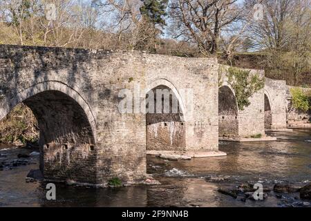 The old stone bridge across the River Usk at Llangynidr, built around 1700 (near Crickhowell, Powys, Wales, UK) Stock Photo