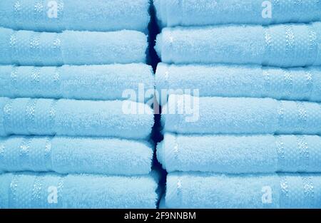 Stacks of Pastel Arctic Blue Fluffy Towels Stock Photo