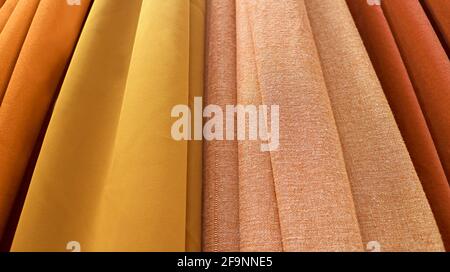 Fabrics in luxurious gold and brown color gradient Stock Photo