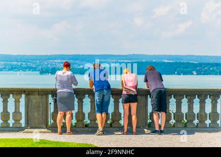 People are looking at the bodensee from terrace in front of the neuese schloss at meersburg Stock Photo