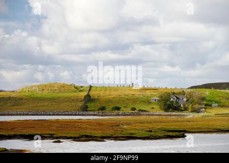 Tursachan prehistoric stones at Callanish, Lewis, Scotland aka Callanish I. View from east showing stones sited on spine of crag and tail landform Stock Photo