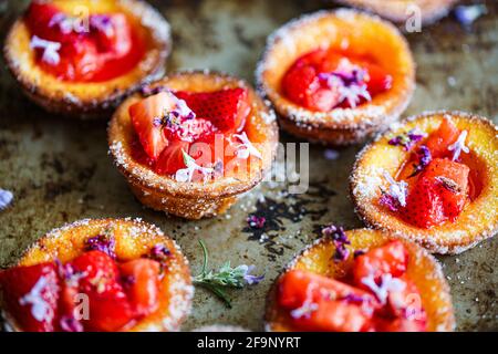 Strawberries and lilac syrup popovers Stock Photo