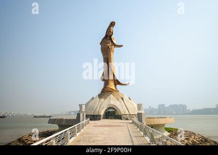 October 12, 2019: Kun Iam Ecumenical Centre, is a 20 meters tall bronze statue dedicated to Guan Yin, goddess of mercy, and located on a man made isla Stock Photo