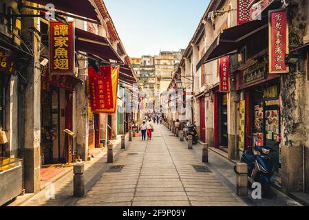 October 10, 2019: Rua da Felicidade, aka Happiness street, was once the heart of red light district of Macau, China. Now it is one of the most popular Stock Photo