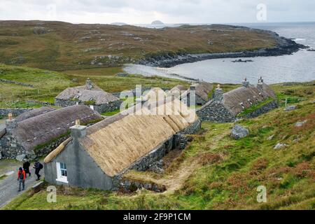 Blackhouse Village. Restored crofting fishing township of Garenin, Na Gearrannan, on north west coast of Lewis, Outer Hebrides.  Lived in until 1974 Stock Photo