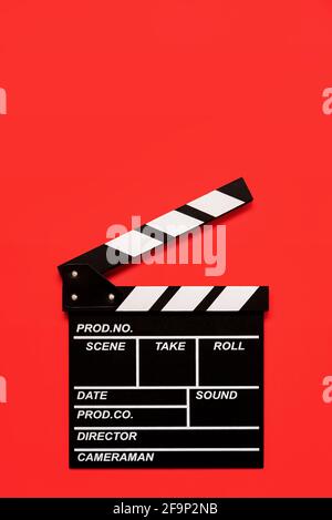 Movie clapperboard with space for text on a red background.Film and cinema concept background Stock Photo