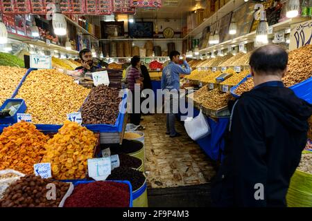 Shop of dried fruits and nuts in the Grand Bazaar of Tehran, Iran. Stock Photo