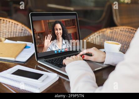 Online Education. Unrecognizable woman having lesson with female tutor via video call Stock Photo