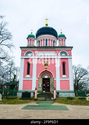 view of pink orthodox church situated near former russian colony alexandrowka in potsdam, germany. Stock Photo