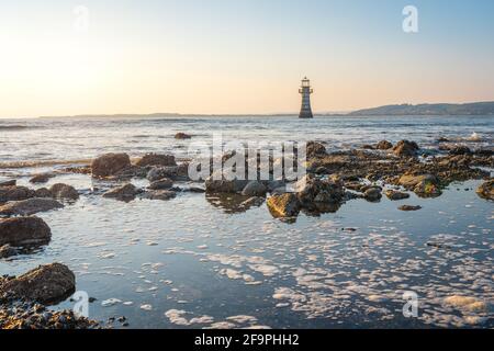 Whiteford Point Lighthouse near Whiteford Sands at sunset, the Gower peninsula, Swansea, South Wales, UK Stock Photo