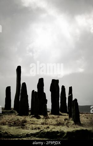 Tursachan prehistoric Neolithic stones at Callanish, Isle of Lewis, Scotland. aka Callanish I. The tall central monolith and part of the core circle Stock Photo