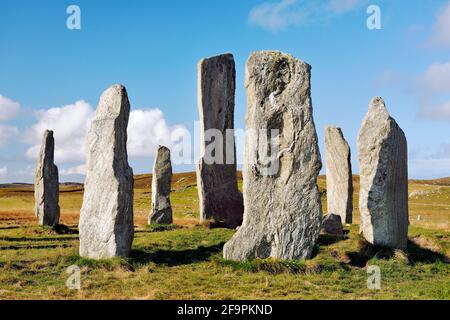 Tursachan prehistoric Neolithic stones at Callanish, Isle of Lewis, Scotland. aka Callanish I. The tall central monolith and part of the core circle Stock Photo