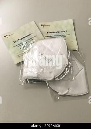 26.01.2021, Berlin, , Germany - FFP2 masks are on authorization slips from the federal government for picking up protective masks at the pharmacy. 00S Stock Photo