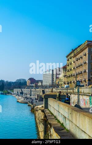 historical buildings stretched along riverside of po river in the italian city torino. Stock Photo