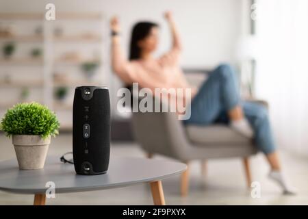 Closeup of smart portable wireless speaker on the table Stock Photo