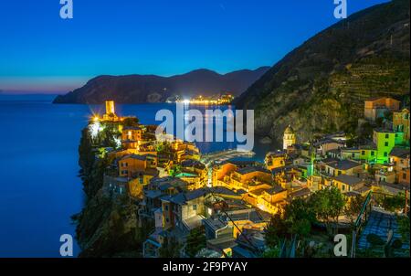 aerial view of vernazza village during night which is part of the famous cinque terre region in Italy. Stock Photo