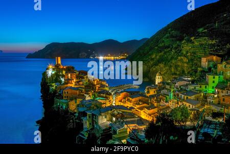 aerial view of vernazza village during night which is part of the famous cinque terre region in Italy. Stock Photo