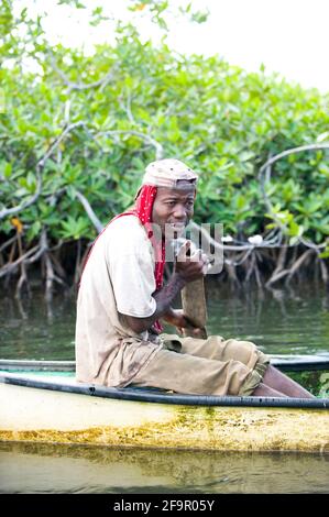 Fisherman in Placencia Lagoon, Placencia, Belize, Central America Stock Photo
