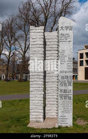 Engraved granite sculpture on Parker's Piece commemorating the birthplace of the rules of football  in 1848. Cambridge, UK. Stock Photo