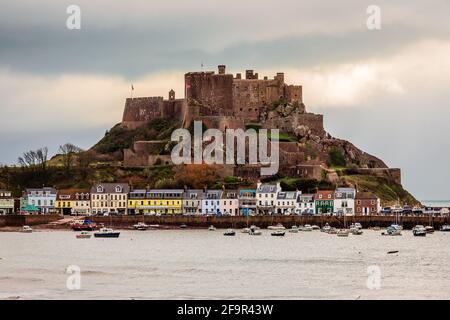 Mount Orgueil castle over the Gorey village, Saint Martin, bailiwick of Jersey, Channel Islands Stock Photo