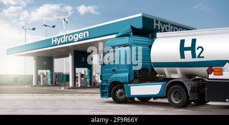 Truck with hydrogen fuel tank trailer on a background of H2 filling station. Concept Stock Photo