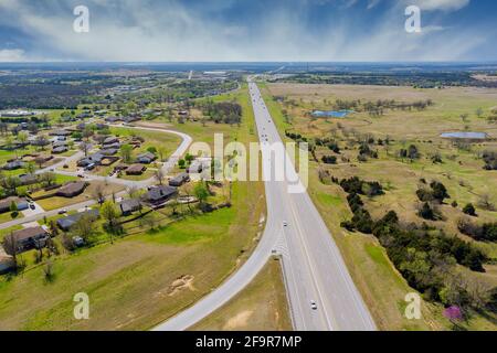 Panorama aerial view of small town near road highway located in central America