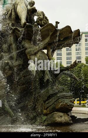 13 May 2019 Berlin, Germany - Neptune fountain (Neptunbrunnen) on Alexanderplatz. Neptune fountain (Neptunbrunnen) on Alexanderplatz in Berlin Stock Photo