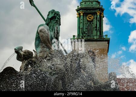 13 May 2019 Berlin, Germany - Neptune fountain (Neptunbrunnen) on Alexanderplatz. Neptune fountain (Neptunbrunnen) on Alexanderplatz in Berlin Stock Photo