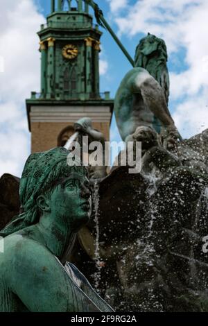 13 May 2019 Berlin, Germany - Neptune fountain (Neptunbrunnen) on Alexanderplatz. Neptune fountain (Neptunbrunnen) on Alexanderplatz in Berlin Stock Photo