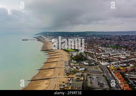 overhead aerial view of Eastbourne seafront with the pier, town and beachy head and the south downs in the distance Stock Photo