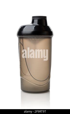 Protein shaker bottle isolated on white background. Translucent plastic container for mixing protein drinks. Empty closed lid shaker for sport food co Stock Photo