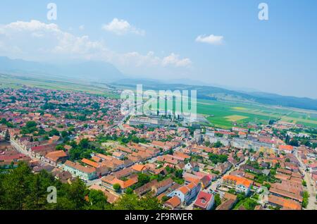 aerial view of romanian city rasnov taken from the top of the fortress. Stock Photo