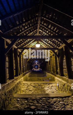 night view of the covered wooden stairway in romanian city sighisoara Stock Photo
