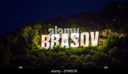 Famous Brasov letters on the Tampa hill during night, Romania Stock Photo