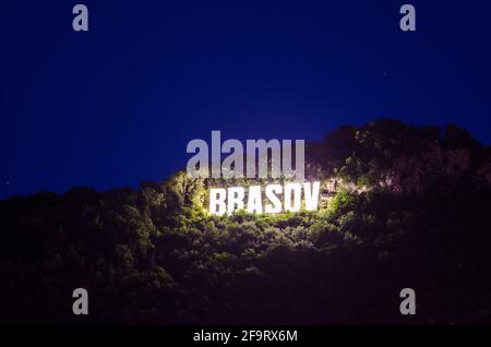 Famous Brasov letters on the Tampa hill during night, Romania Stock Photo