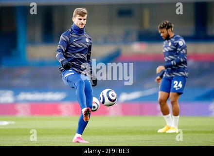 Chelsea's Timo Werner (left) warms up before the Premier League match at Stamford Bridge, London. Picture date: Tuesday April 20, 2021. Stock Photo