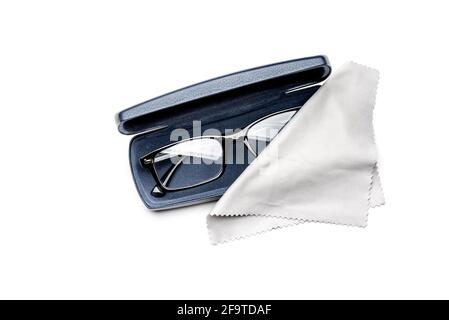 Modern spectacles, or eyeglasses, with a microfiber cloth, in a dark blue leather case, isolated on a white background Stock Photo