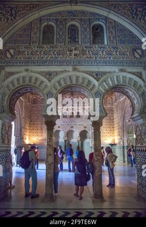 Islamic arches in Moorish Palace inside the Royal Alcazar of Sevilla, Seville, Spain Stock Photo