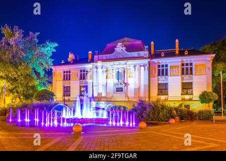 Night view of the Szczepanski Square with fountain and Palace of the Arts, opened in 1901 in Krakow, Poland. Stock Photo