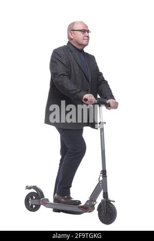 side view . Mature man with electric scooter looking forward Stock Photo