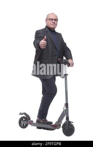 side view . Mature man with electric scooter looking forward Stock Photo