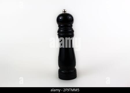 Black woodbine pepper mill isolated on white background Stock Photo