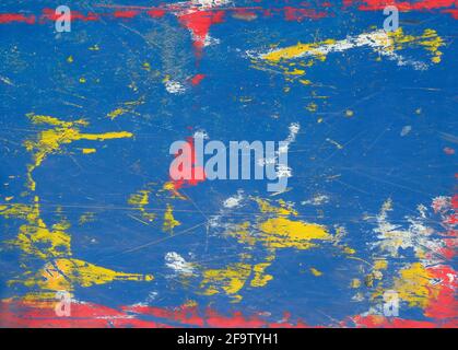 Abstract grunge background with smeared paint on blue background Stock Photo