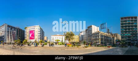 ATHENS, GREECE, DECEMBER 10, 2015: people are passing thorugh omonia square in athens Stock Photo