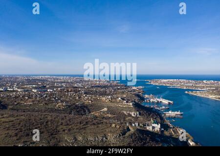 Sevastopol from the Inkerman side. Panorama of the central Sevastopol bay with ships. Sevastopol in December. Stock Photo