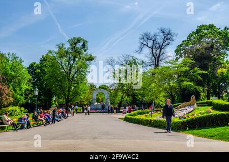 VIENNA, AUSTRIA, MAY 15, 2015: People are relaxing in stadtpark in vienna during sunny day in early summer Stock Photo