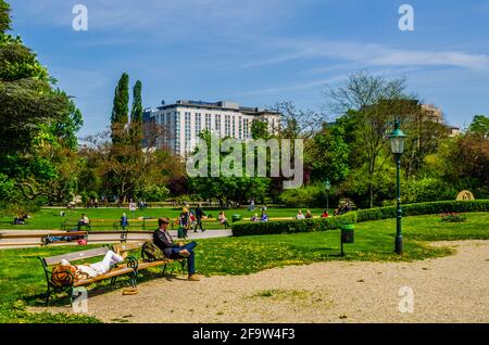 VIENNA, AUSTRIA, MAY 15, 2015: People are relaxing in stadtpark in vienna during sunny day in early summer Stock Photo